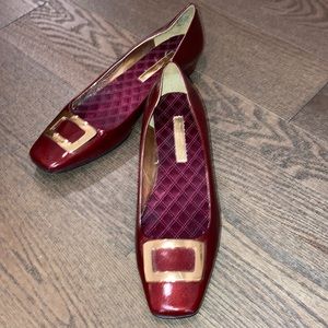 Red patent shoes with gold buckle. Enzo Angiolini.